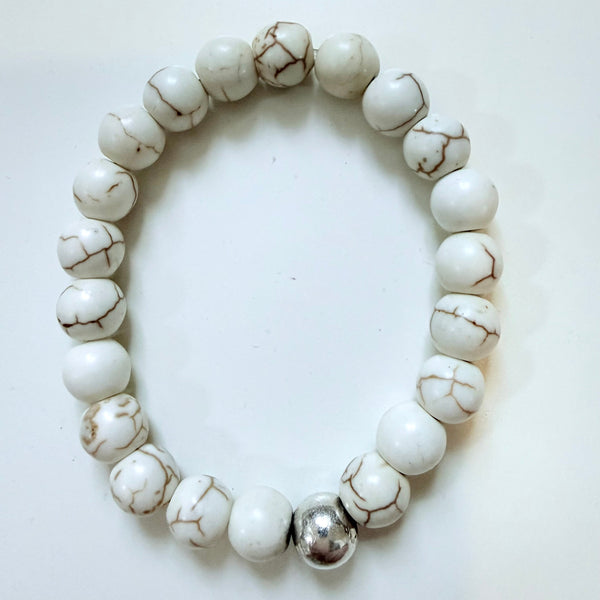 White Howlite beaded bracelet on a white background