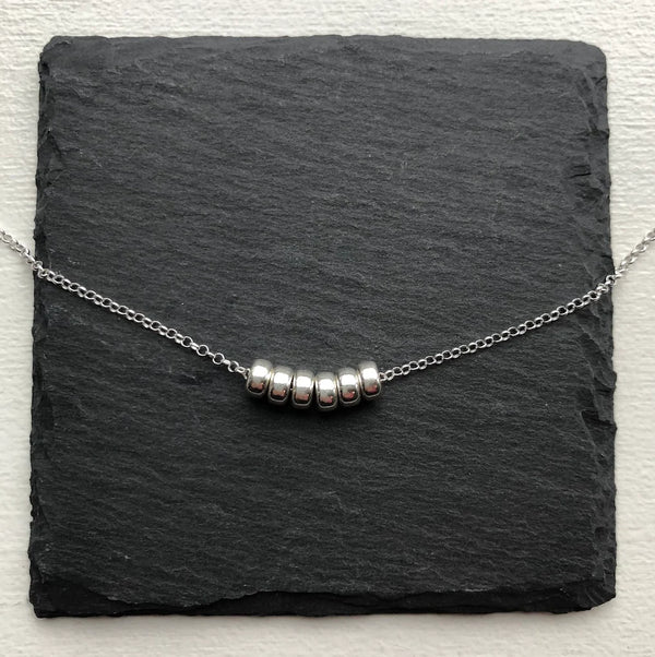 Sterling silver Decade Necklace – personalized milestone jewelry hand stamped in Toronto by CITRUS