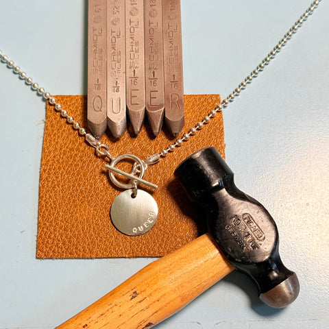 Love Necklace with silver chain with silver pendant hand stamped with QUEER